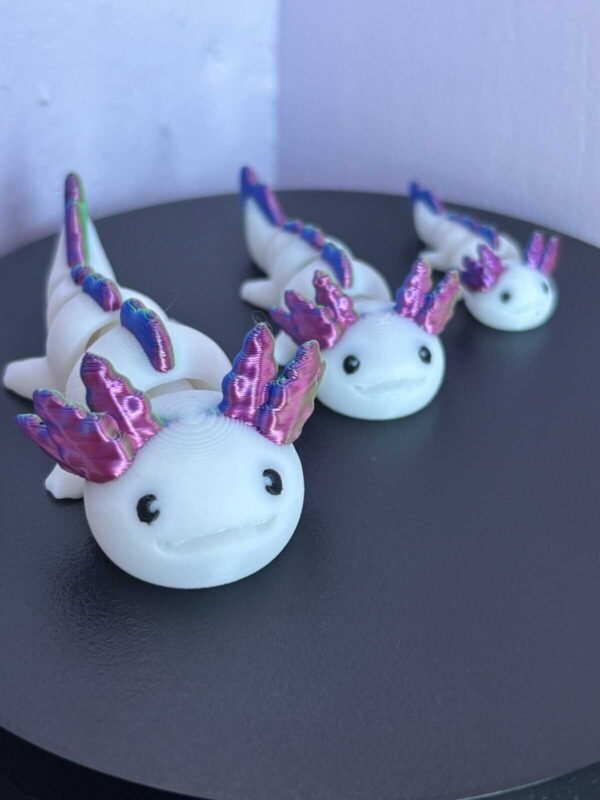 0117525a23ce11e461bf2c269799862a629bd6a445 Pastel pink articulated axolotl fidget toy, 3D printed in PLA