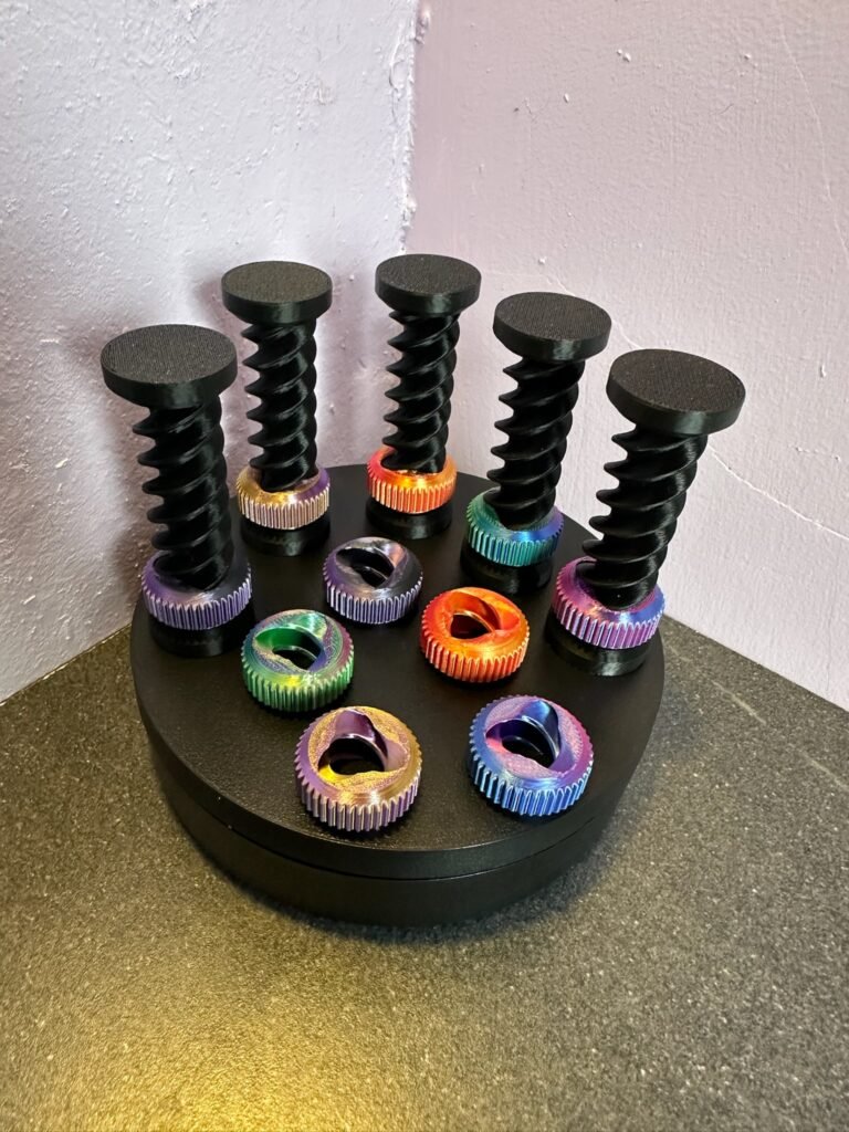 Twist fidget toy with 5 colourful nuts