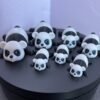 Black and white articulated panda fidget toy, 3D printed in PLA
