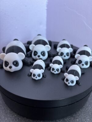 Black and white articulated panda fidget toy, 3D printed in PLA