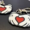Mickey and Minnie-style 3D printed hand heart keyrings in white PLA with bow and heart detail variations