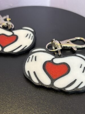 Mickey and Minnie-style 3D printed hand heart keyrings in white PLA with bow and heart detail variations
