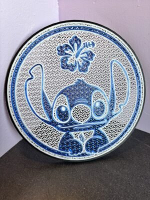 3D printed Stitch pin board with blue alien ears design for displaying enamel pins