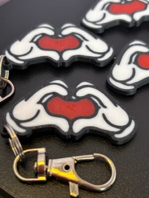 Mickey and Minnie-style 3D printed hand heart keyrings in white PLA with bow and heart detail variations
