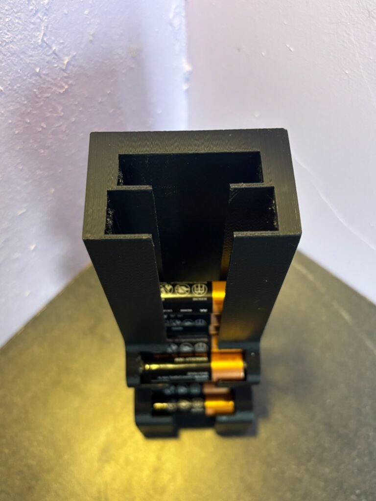 3D printed AA and AAA battery dispenser holder side view