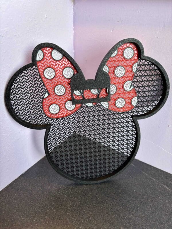 01be8f605f1935286ae0d68f586c0ecccb623de6d8 3D printed Minnie pin board with bow design in black and red PLA for displaying enamel pins