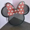 3D printed Minnie pin board with bow design in black and red PLA for displaying enamel pins