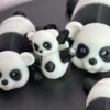 Black and white articulated panda fidget toy, 3D printed in PLA