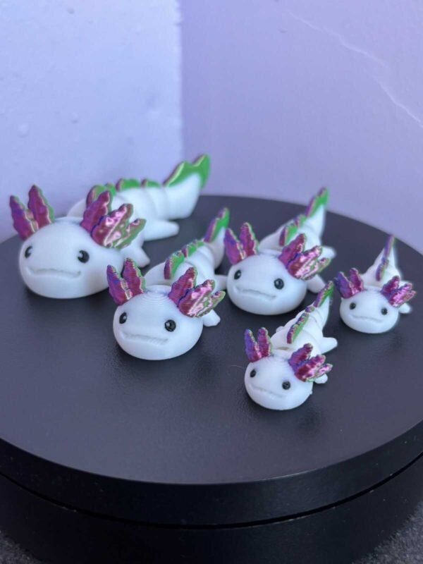 01f3495550b5ba2306672005088a090c45c58b2ff4 Pastel pink articulated axolotl fidget toy, 3D printed in PLA