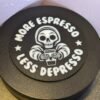 Black coaster with skull and text More Espresso Less Depresso