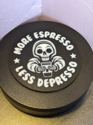 Black coaster with skull and text More Espresso Less Depresso