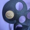 Black 3D printed coin display for Disney-style coins