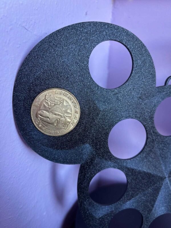Black 3D printed coin display for Disney-style coins