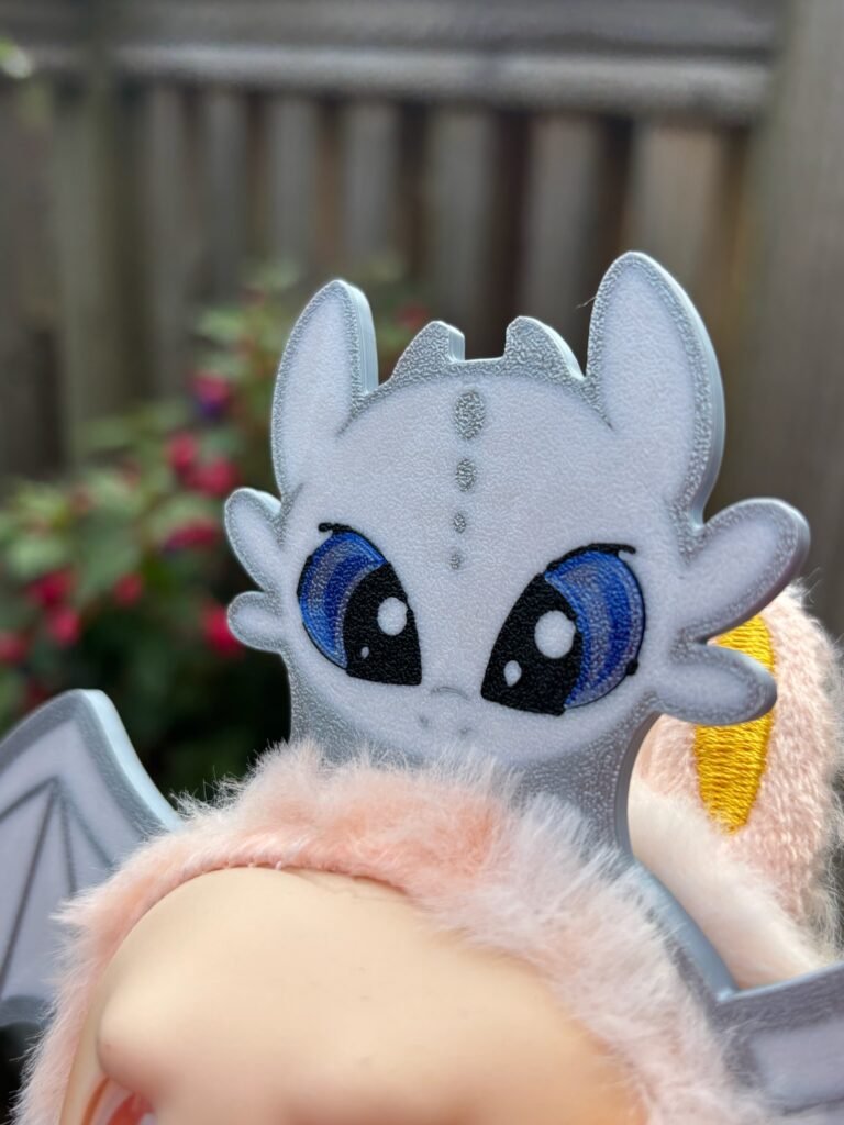 Close-up of Light Fury fan-art Labubu ears accessory