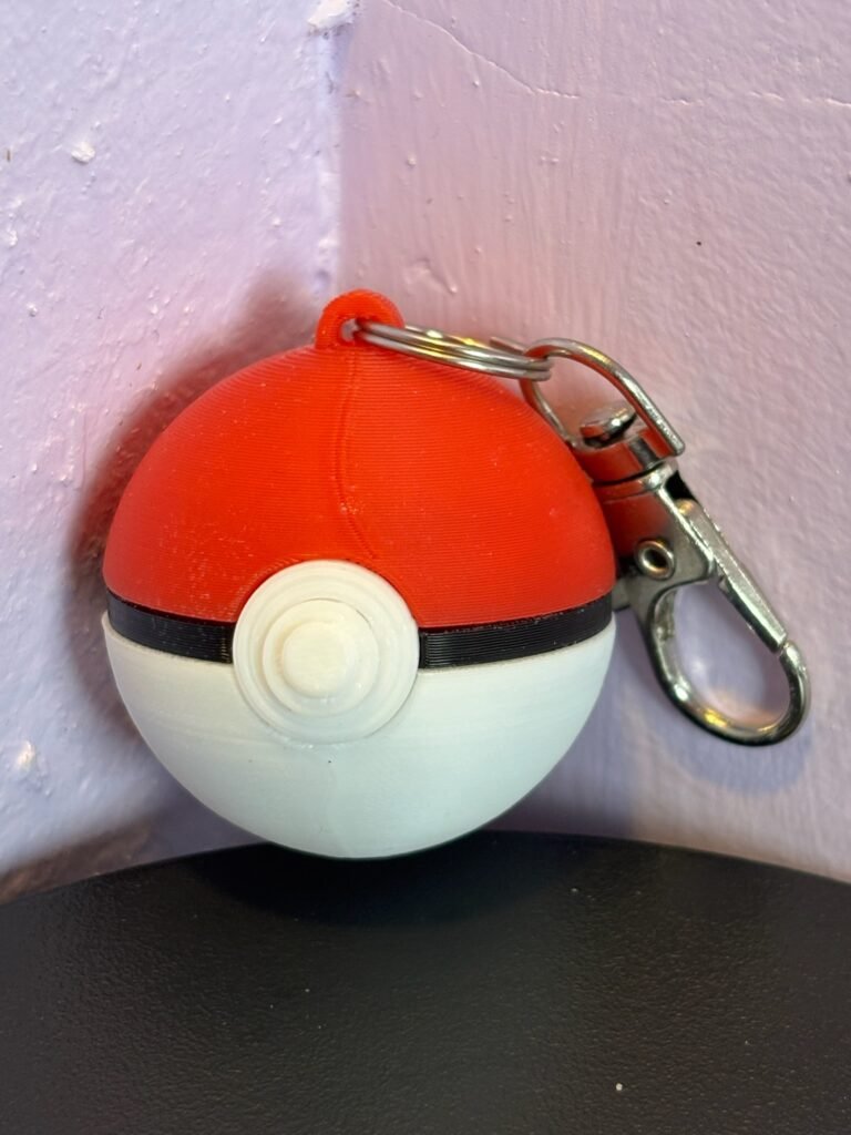 Fan-made Poké Ball design keychain with silver clip