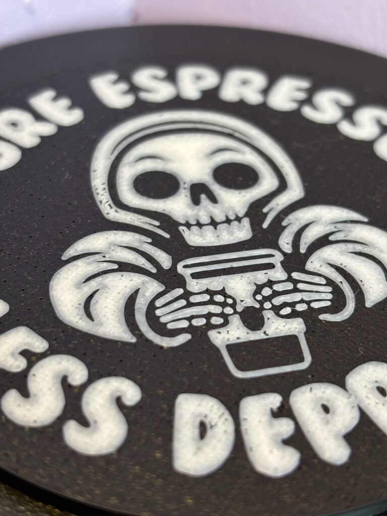 Close-up of coffee-themed coaster gift