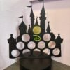Castle inspired coin holder silhouette with 12 slots for collector coins