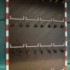 LEGO Speed Champions mini F1 wall display stand holding 12 Formula One cars on a racetrack-style board