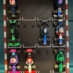 LEGO Speed Champions mini F1 wall display stand holding 12 Formula One cars on a racetrack-style board