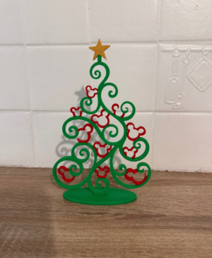3D printed green and red mouse-inspired Christmas tree decor on tabletop