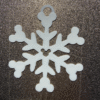 Close-up of festive mouse snowflake Christmas tree decoration
