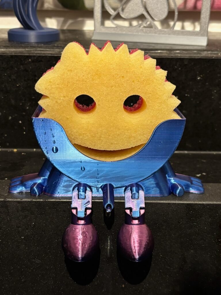 Draining sponge holder compatible with Scrub Daddy