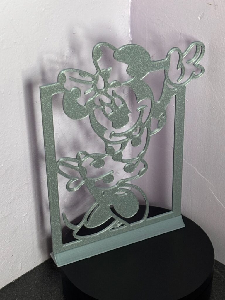 3D printed mouse silhouette décor on display stand