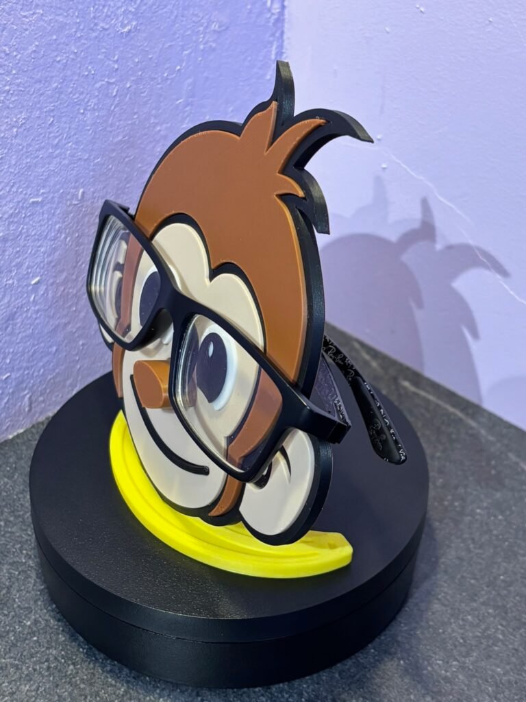 Cheeky monkey glasses holder 3D printed desk stand holding glasses