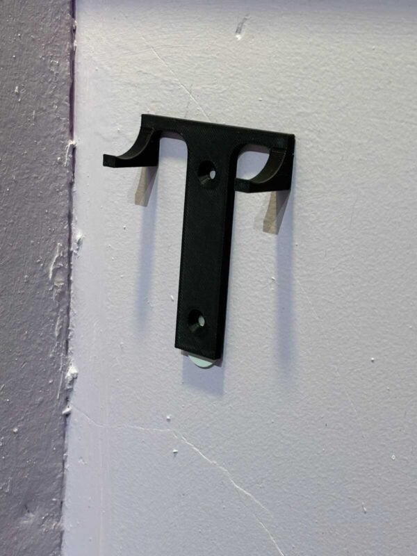 Small black wall hook for Formula 1 car display