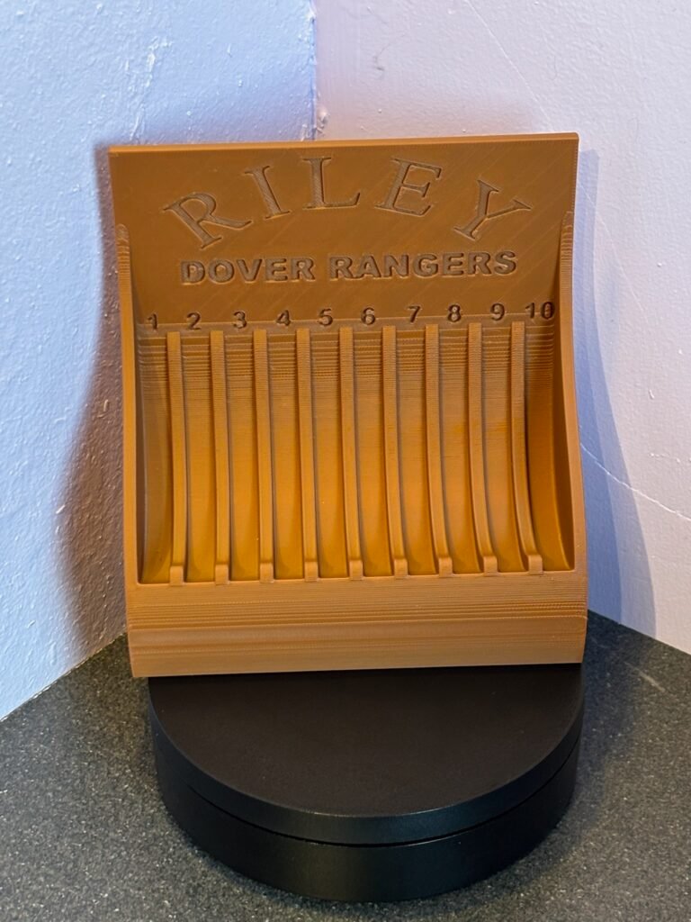 3D printed football coaster holder holding 10 awards