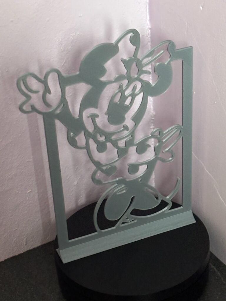 3D printed mouse silhouette décor on display stand