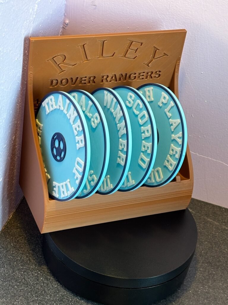 3D printed football coaster holder holding 10 awards
