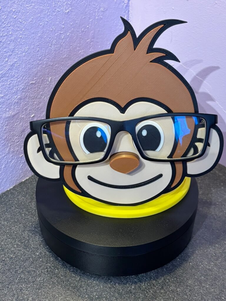 Cheeky monkey glasses holder 3D printed desk stand holding glasses