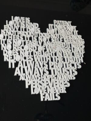 1 Corinthians 13 love heart wall art — 3D printed pearlescent white scripture heart on black background, full Bible verse typography, UK made Christian wedding gift