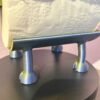 Close-up of hooved legs on 3D printed highland cow toilet roll holder — sturdy freestanding base designed for bathroom shelves and windowsills