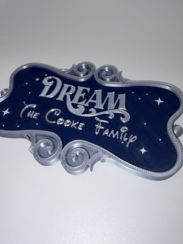 Personalised cruise ornate stateroom door plaque showing year text option — navy and silver 3D printed magnetic cruise door decoration with ornate scroll frame, UK made