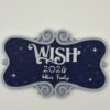 Personalised magical cruise ship name door plaque — navy blue starry night background with silver ornate scroll frame, showing "Wish 2026 Hills Family" in white raised text, UK 3D printed cruise magnet