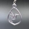 Close-up of lilac hummingbird in teardrop frame dangle earring with silver hypoallergenic hook - HulkyWears 3D printed jewellery