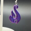 Close-up of purple-blue silk flame swirl dangle earring showing colour shift and flowing silhouette detail - HulkyWears UK