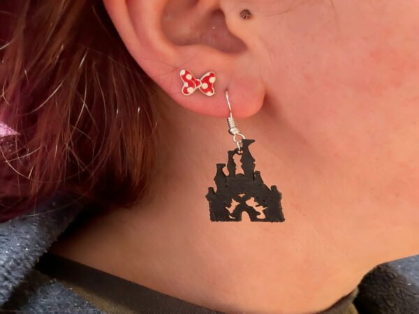 lose-up of black fairy tale magic castle dangle earring with soaring spires and silver hypoallergenic hook - HulkyWears 3D printed jewellery