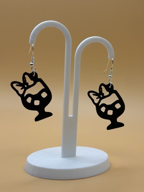 Pair of black Minnie Mouse cocktail glass dangle earrings on display stand - 3D printed Disney fan jewellery by HulkyWears UK