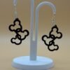 Pair of black Mickey head cluster dangle earrings on display stand - 3D printed Disney fan jewellery by HulkyWears UK