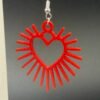 Red sunburst heart dangle earring close-up with silver hypoallergenic hook - 3D printed EcoPlastic jewellery by HulkyWears