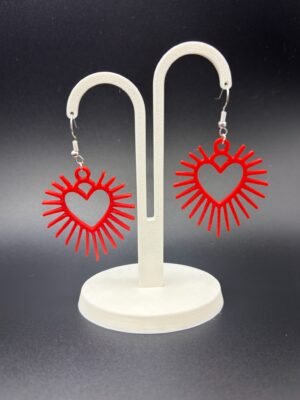 Pair of red sunburst heart dangle earrings on display stand - 3D printed romantic jewellery by HulkyWears UK