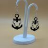Close-up of black Mickey anchor dangle earring with silver hook - 3D printed EcoPlastic fan jewellery by HulkyWears UK