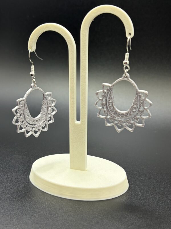 Pair of silver white mandala hoop dangle earrings on display stand - 3D printed EcoPlastic boho jewellery by HulkyWears UK