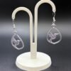 Pair of lilac hummingbird teardrop dangle earrings on display stand - 3D printed EcoPlastic nature jewellery by HulkyWears UK
