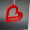 Pair of red open wave heart dangle earrings on display stand - 3D printed EcoPlastic jewellery by HulkyWears UK