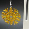 lose-up of golden snowflake dangle earring showing intricate branching arms and bobble tips - 3D printed PLA jewellery by HulkyWears