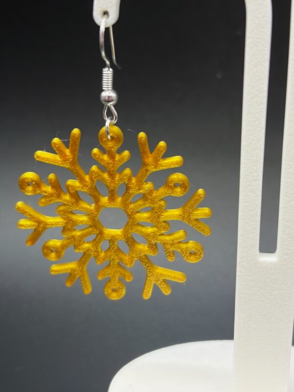 lose-up of golden snowflake dangle earring showing intricate branching arms and bobble tips - 3D printed PLA jewellery by HulkyWears